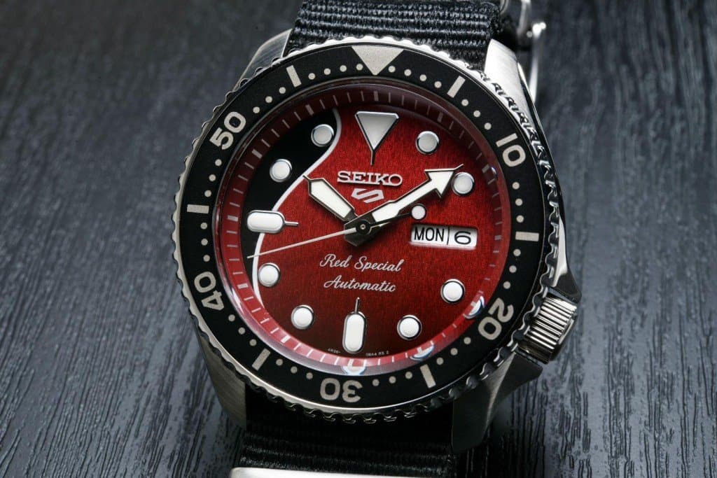 NEW Seiko 5 Sports 100M LE Queen's Brian May Automatic Men's Watch Red Dial Nylon Strap SRPE83K1 - Diligence1International
