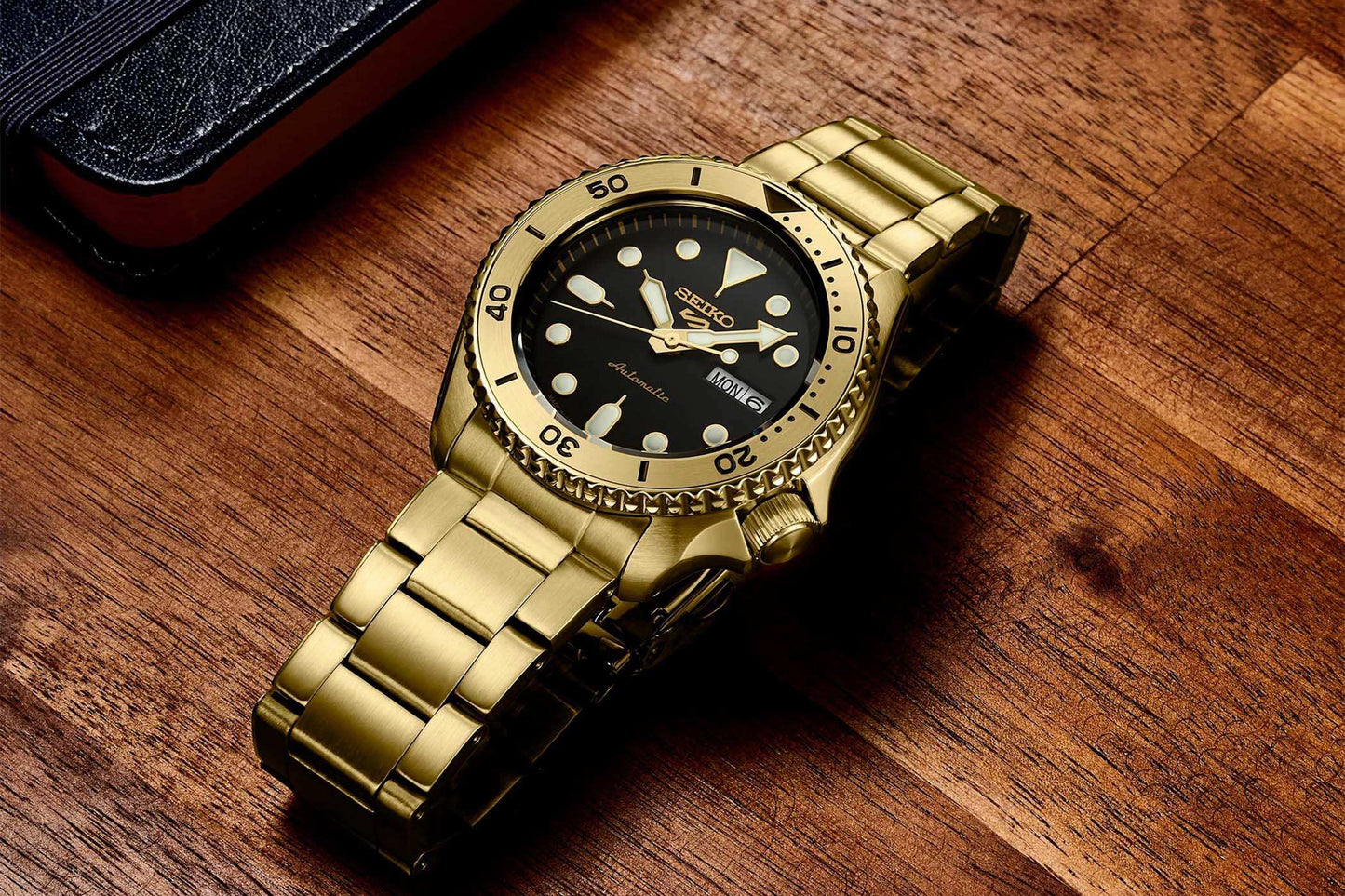 Seiko 5 Sports 100M U.S. Special Gold Plated Bezel Black Dial Watch SRPK18 J1