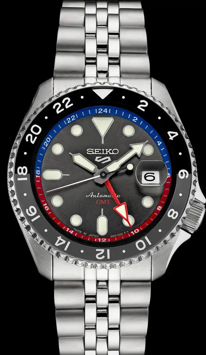Seiko 5 100M GMT Style U.S. Special Black and Gray Bezel Red and Blue Inner Ring Charcoal Dial Stainless Steel Watch SSK019 J1
