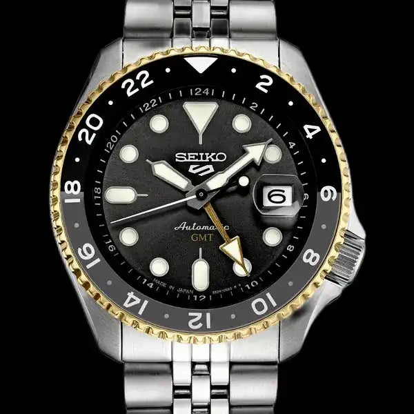 Seiko 5 100M GMT Style U.S. Special Black on Gold Plated Bezel Charcoal Dial Stainless Steel Watch SSK021 J1