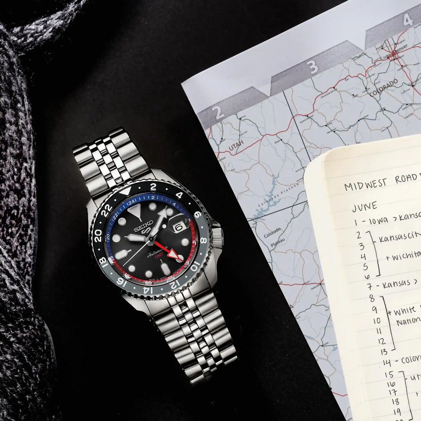 Seiko 5 100M GMT Style U.S. Special Black and Gray Bezel Red and Blue Inner Ring Charcoal Dial Stainless Steel Watch SSK019 J1
