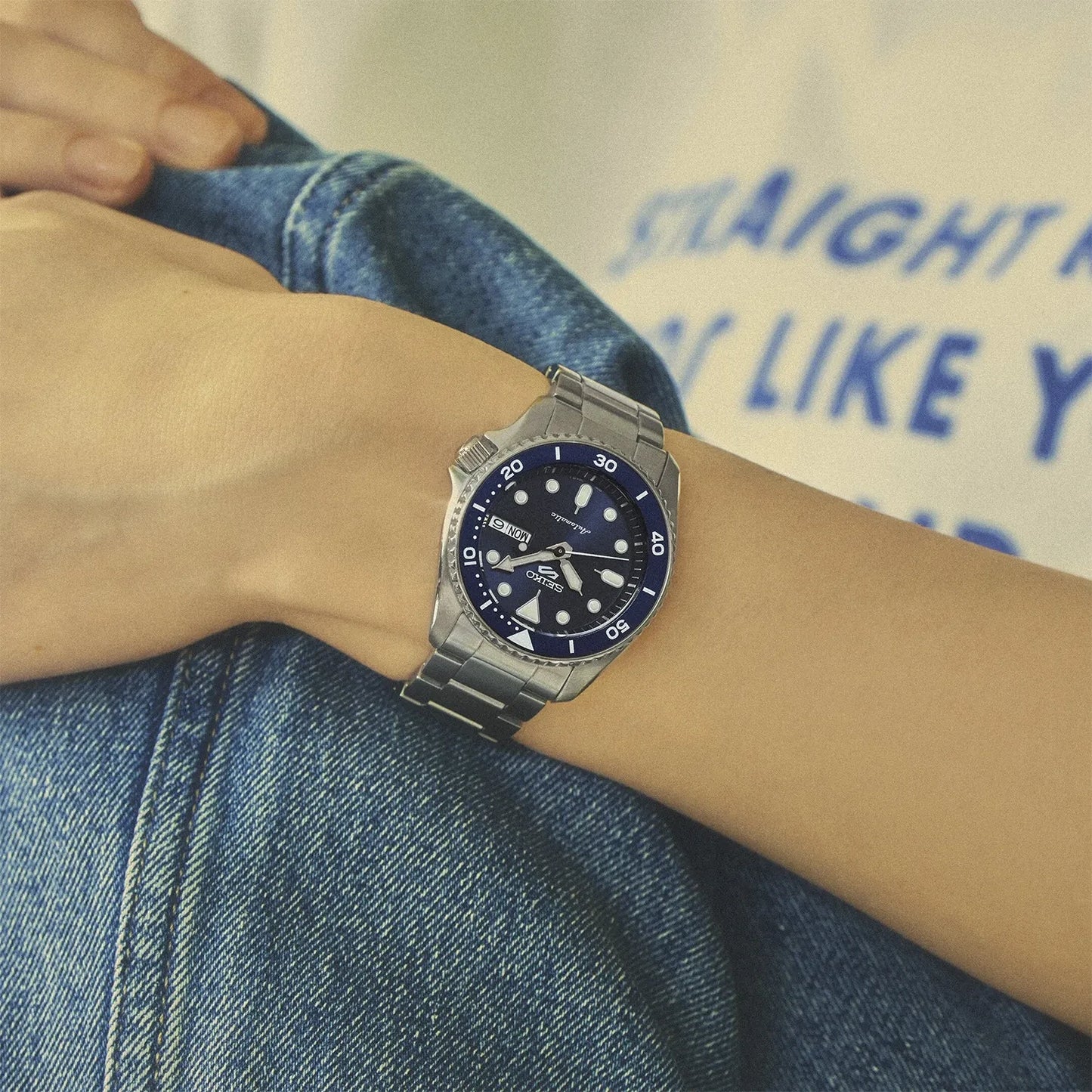 Seiko 5 Sports 100M Automatic Boy Size 38mm Watch Blue Bezel Street Denim Dial SRPL77K1